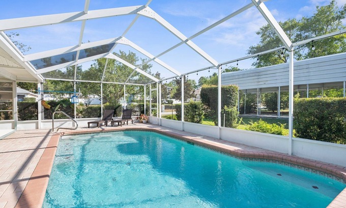 Spring Hill House | Clean, spacious home with heated pool near Weeki Wachi Springs!