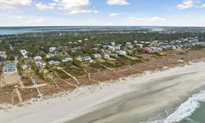 Isle of Palms Villa | Coastal oasis: heated pool, rooftop, putting green + walk to the beach