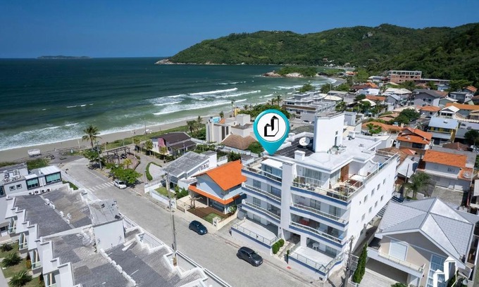 Canto Grande Apartment | Cobertura duplex com vista para o mar e jacuzzi