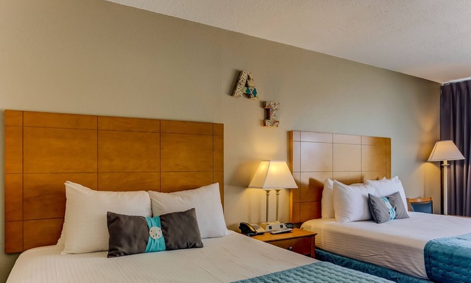 Fernandina Beach Hotel | Come relax in the gentle ocean breeze at the only oceanfront motel on Amelia Island, FL. Our rooms provide a clear view of the ocean, as well as, direct access to the Atlantic Ocean. No streets to cross or cars to dodge, just you, your family, and th