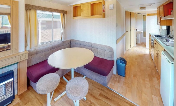 Llanllwchaiarn House | Comfortable caravan with one double and two twin.