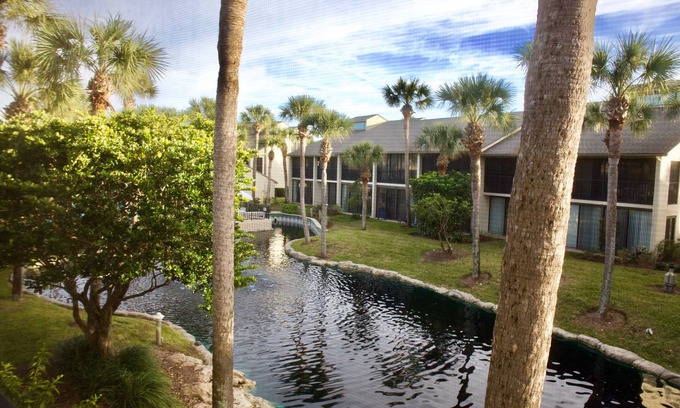 Butler Beach Condo | Comfortable gold-rated condo with lagoon views and terrific southern exposure!