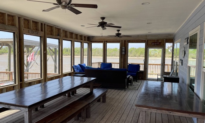 Matagorda Cottage | Comfortable Two Bedroom on the river, WIFI, Lighted Pier with beautiful sunsets!