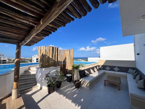 Luis Donaldo Colosio Apartment | Condo Boho con Roof pool y vista al mar