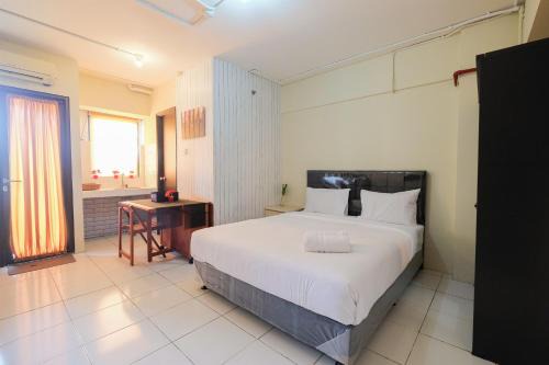 Kebagusan Apartment | Contemporary Studio at Kebagusan City Apartment By Travelio