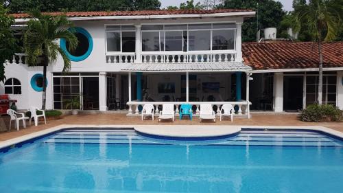 Punta Sur Hotel | Coral House SAI