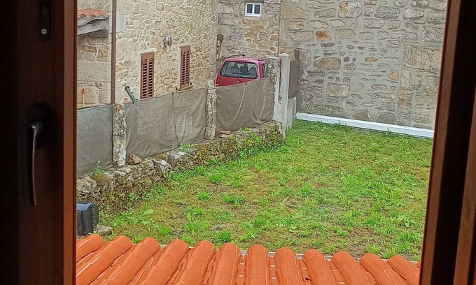 Muros Cottage | Correlo Muros House. With porch and land. Renovated stone house. VUT-CO-010202