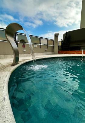 Gonzaga Hotel | Cosmopolitan PRAIA Flat com Estacionamento Incluso - Gonzaga - Ap 76