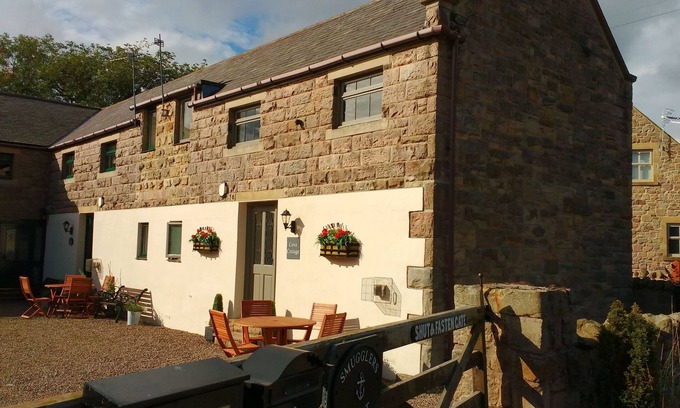Waren Mill House | Cove Cottage - charming quiet barn conversion near the sea Budle Bay, Waren Mill