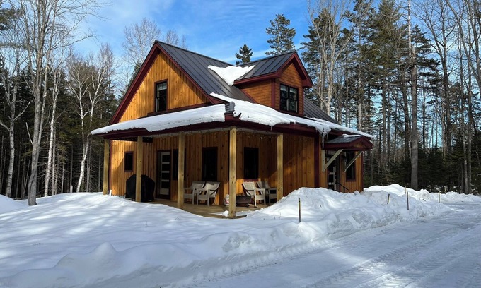 Mount Sunapee Cottage | Cozy cabin nestled in the woods, 5 minutes to Sunapee Mountain & lake!