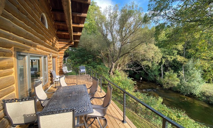 Pentwater Cabin | Cozy cabin on the serene Pentwater River with hot tub and ac