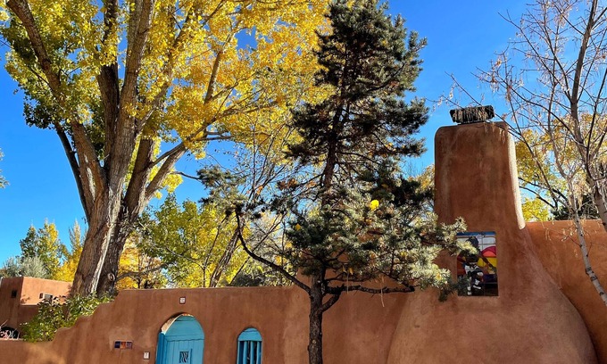 Taos Condo | Cozy Casa Carmelita features a Brilliant Kiva Fireplace, Unique Patio & Hot Tub!
