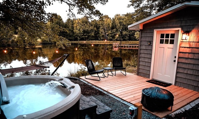 Hurdle Mills Cabin | Cozy Lakefront Cottage with Hot Tub on 25-Acre Private Retreat