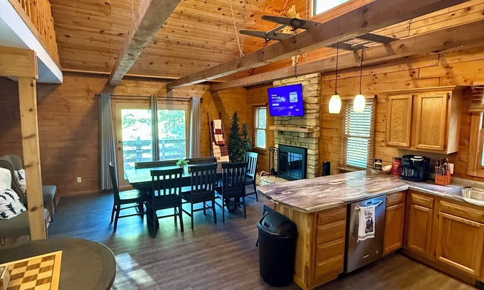 Coal Valley Cabin | Cozy Log Cabin overlooking a pond with a fire pit, game area and rustic charm
