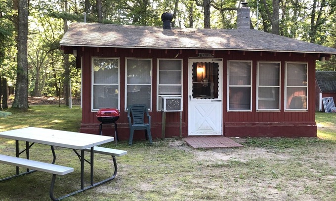 Pentwater Cabin | Cozy "Up North" Cabin in the woods with Pentwater Lake frontage and access