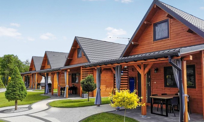 Lubrza House | Create lasting vacation memories in this inviting cottage near the lake.