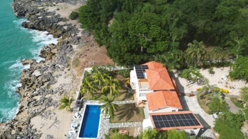 Playa Chiquita Villa | Crimson beach ocean front entire floor villa