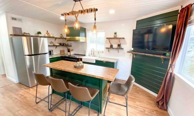 East Dubuque Cabin | Custom Floating Cabin on Mississippi River backwater with a HOT TUB!