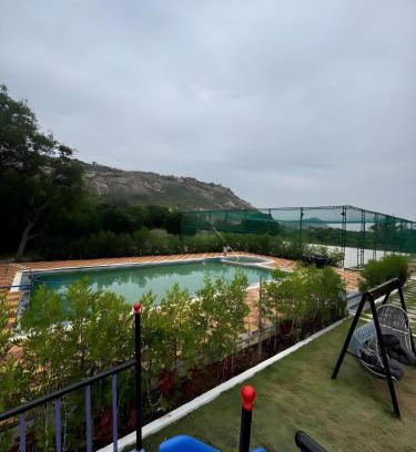 Kalwakurti Villa | Deccan Green 3BR Pvt Pool Farmhouse By Homeyhuts