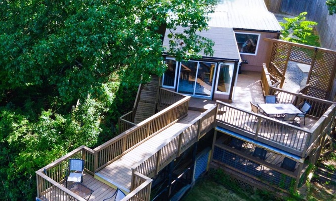 Cave Spring Cabin | Dockside Dreams at Rivers Edge Retreat – 2 bd/1ba Waterfront home on the Coosa River at Lake Weiss (GA/AL line). This updated, newly renovated ranch-style home offers the perfect setting to unplug, recharge and make wonderful lifetime memories!