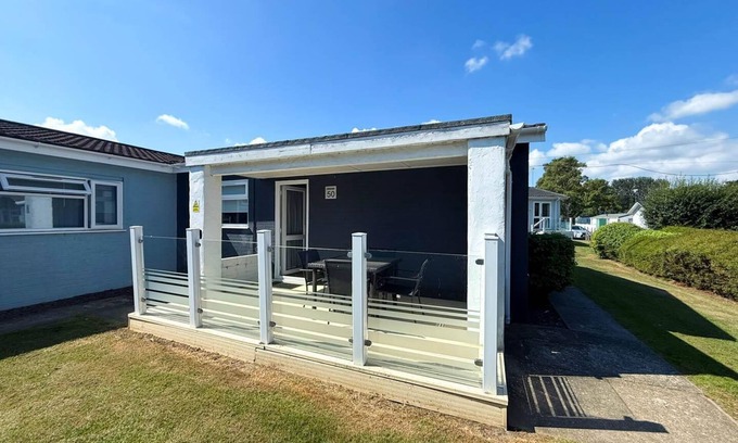 Oulton Broad Ski Chalet | Dog friendly chalet with outdoor seating at Broadland Park and Marina ref 12050B