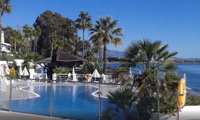 New Golden Mile Apartment | Dominion Beach Ground floor app. with garden 6 people directly by the sea and swimming pool