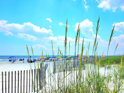 Myrtle Beach House | Dreams by the Sea Spacious 2BR Villa with Pool, Balcony, Beach Access & Seasonal Free Attractions