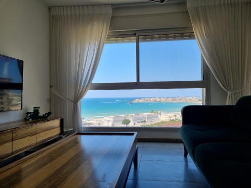 Acre Apartment | Ducks on the beach