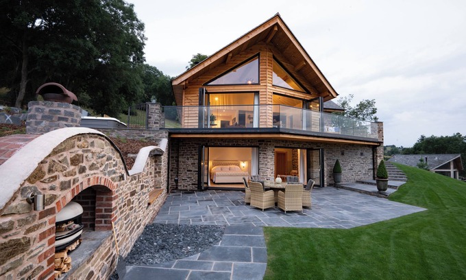 Montgomery House | Eithriadol Maldwyn is a collection of luxury countryside homes with a sauna and hot tubs. Pet friendly with electric car chargers, sleeping 16.