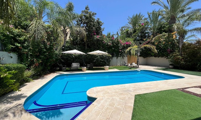 Caesarea Villa | Elegant 5BR Haven with Sparkling Pool & Serene Garden Oasis