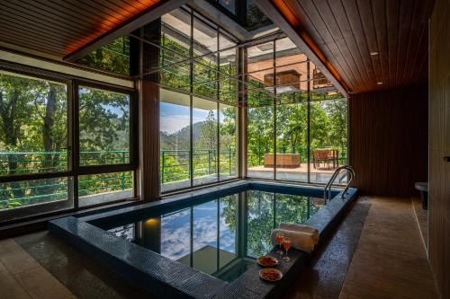 Shyamkhet Villa | ELIVAAS Blushing Pines 3 BHK With Indoor Pool, Attic and Classy Interiors