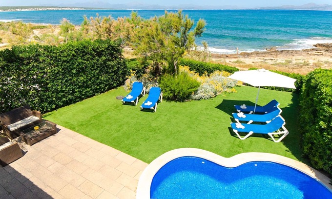 Urbanizacion S'Estanyol Villa | EMBAT - Seafront house with garden, pool and bbq.