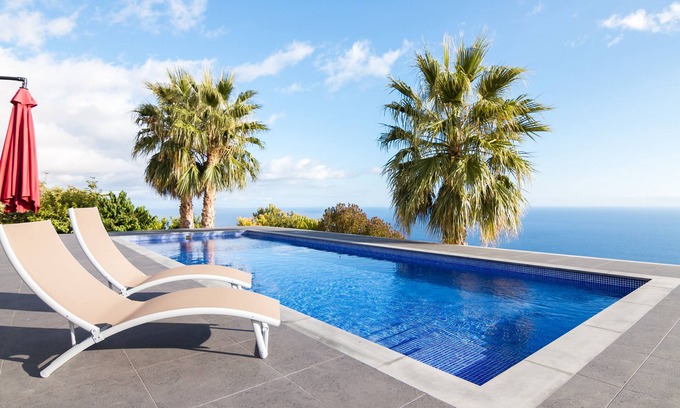 Calheta House | Endless Blue House view of the ocean with a huge pool