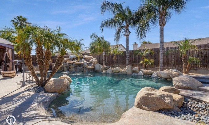 Greenacres House | Enjoy a Mini Oasis w/Pool Waterfall 4bd/2ba Home!