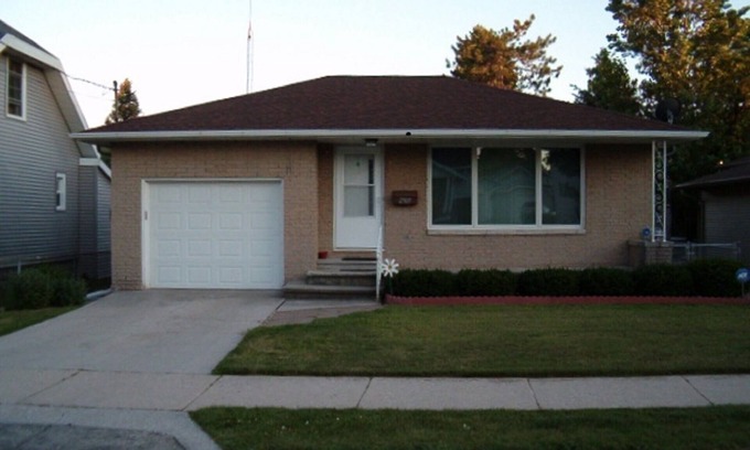 Two Rivers House | Enjoy Lake Michigan sport fishing, beaches, and hiking trails.