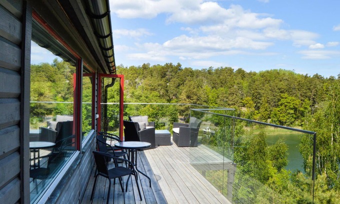 Dalaro House | Enjoy relaxing baths in the jacuzzi with sea view in this vacation home.