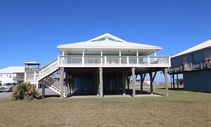 Grand Isle House | Experience beachfront luxury at Orange Beach Retreat in Grand Isle, LA, perfect for 16 guests.