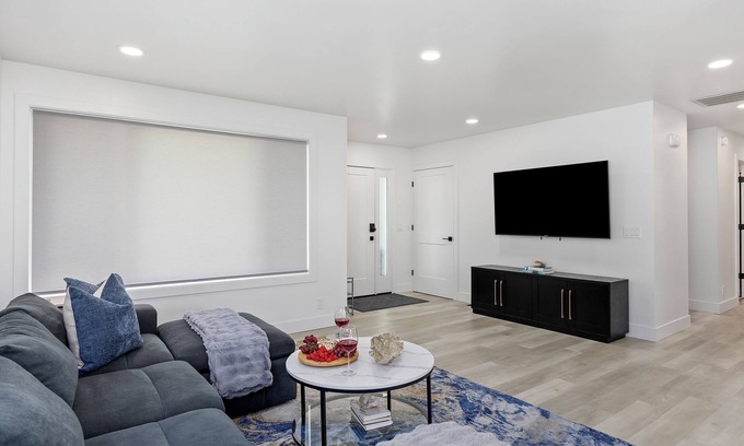 Burley House | Experience elevated comfort in this thoughtfully designed retreat. Featuring two inviting bedrooms, a fully equipped kitchen, and serene details, it blends simplicity with style for a clean, welcoming stay.