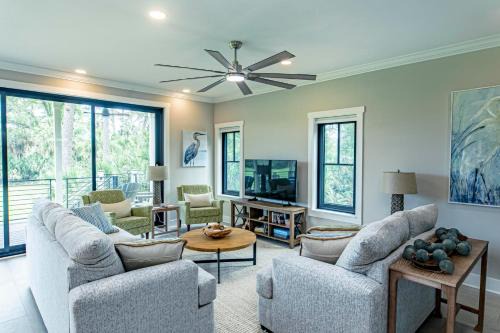 Sweetgrass House | Experience Modern Coastal Living in this Beautifully Designed 4-Bed, 4-Bath Home