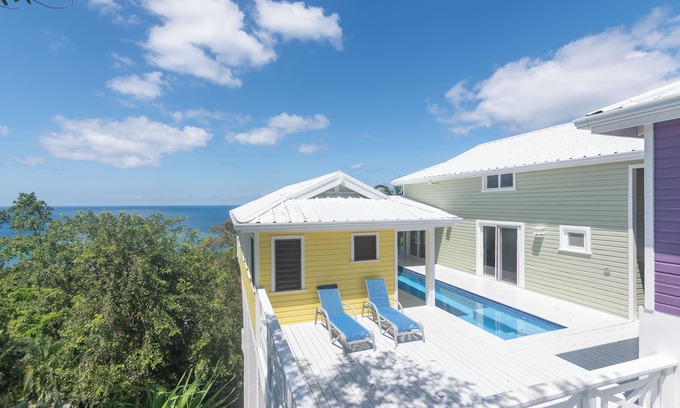 Antoneys Cay House | Experience tropical living at Casa Afortunada, 4-bedroom home with stunning ocean views.