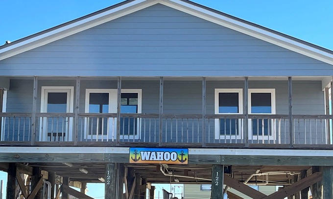 Golden Meadow House | Experience waterfront living at Wahoo in Grand Isle, LA, with boat access and cozy amenities.