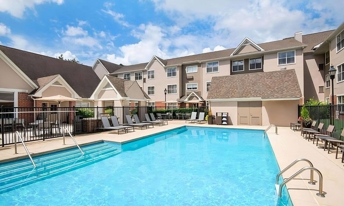 Town Center Apartment | Family Hotel with Fully Equipped Kitchen & Outdoor Pool in Downtown Kennesaw!