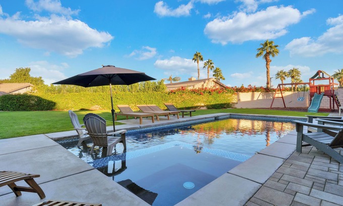 Indio House | Family Oasis on 1/4 acre! Pool, putting green + swingset! 30 min to Joshua Tree!