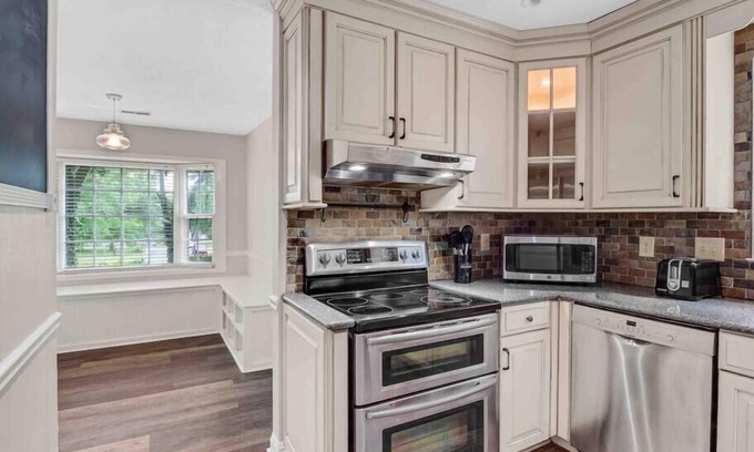 Matthews House | Fenced in backyard 4 Family gatherings & Dog Park