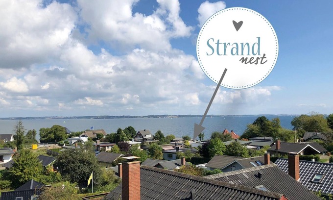 Bockholm House | fewo1846 - StrandNest - House with view of the fjord, fireplace, sauna and 3 bed