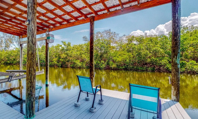 Ruskin House | Fishing getaway with a pool, hot tub, game room, dock, and grill - dog-friendly