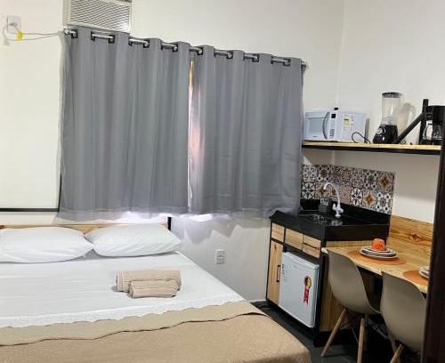 Jardim Ipe Apartment | Flat com ar e varanda com linda vista para o Ibituruna - Vôo Livre 203