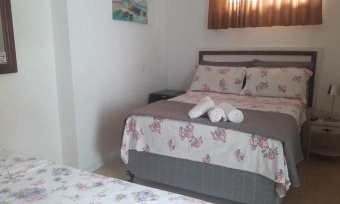 Muquem House | Florianópolis Suites confortáveis