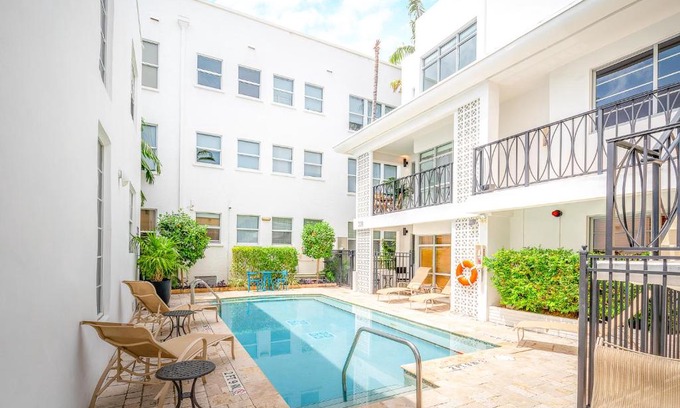 South Pointe Apartment | Fountain condo 2 story Pool BBQ Balcony