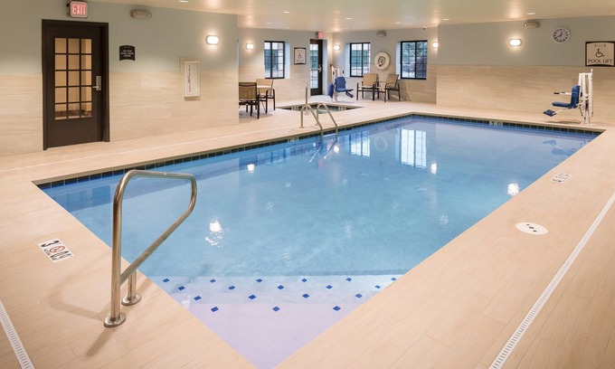 West Omaha Condo | Free Breakfast. Pool. Near the Nebraska Medical Center!